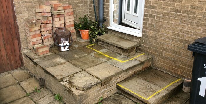 Before image of concrete steps and entrance