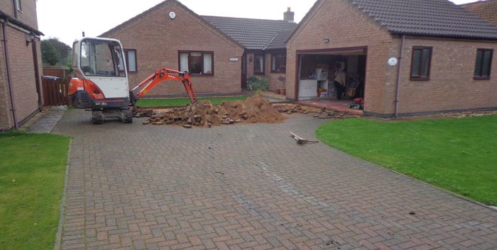 Before image of block paved driveway