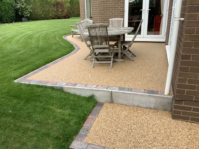 After image new resin patio in Autumn Red