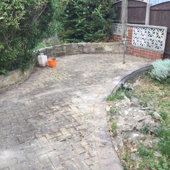 Before image of block paved driveway