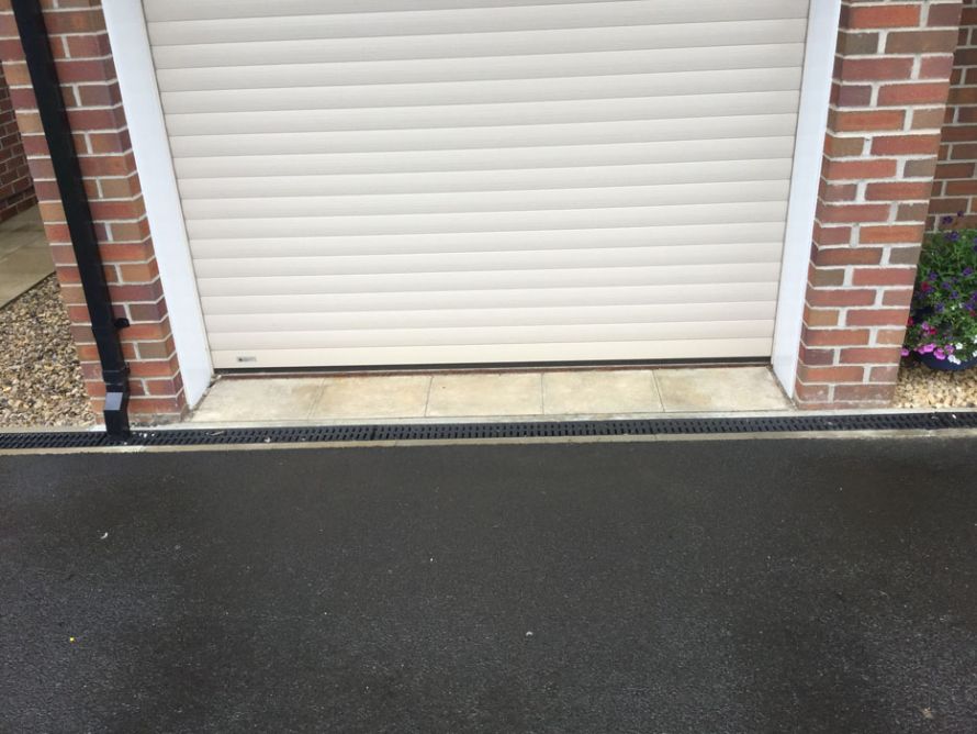 Before image of a concrete driveway