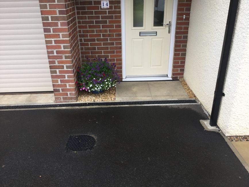 Before image of a concrete driveway